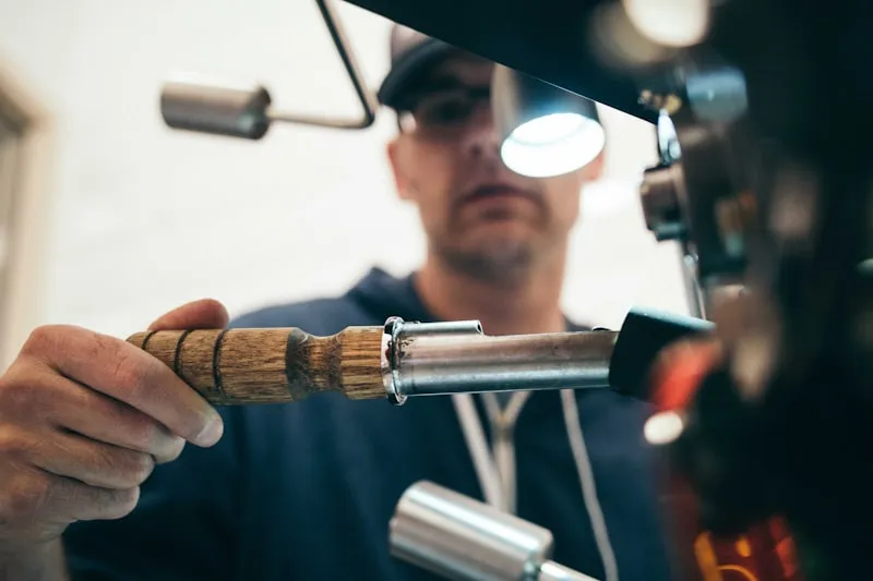 Locksmith working on lock hardware